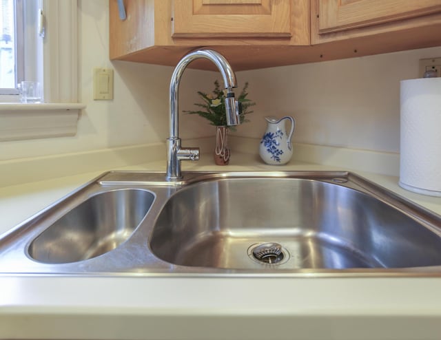 details with light countertops and a sink