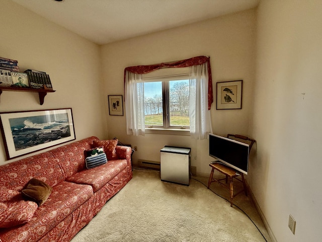 carpeted living room featuring baseboards