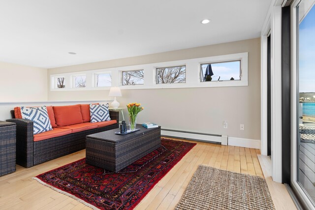 21 Atlantic St, Rockland, ME 04841 - living room featuring recessed lighting, hardwood / wood-style flooring, and a baseboard heating unit