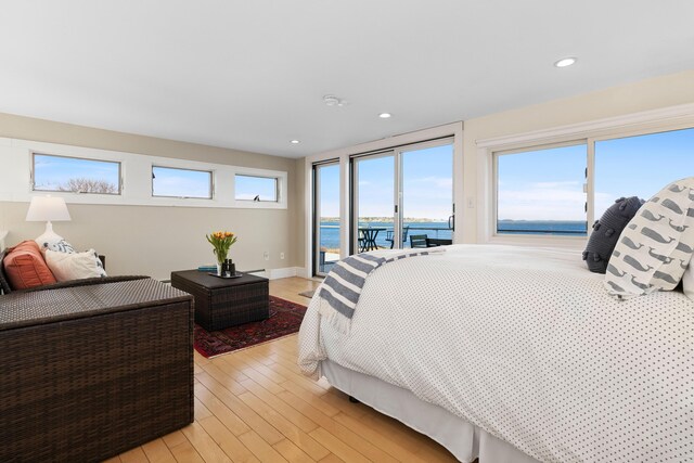 21 Atlantic St, Rockland, ME 04841 - bedroom with access to outside, recessed lighting, light wood-type flooring, and a water view