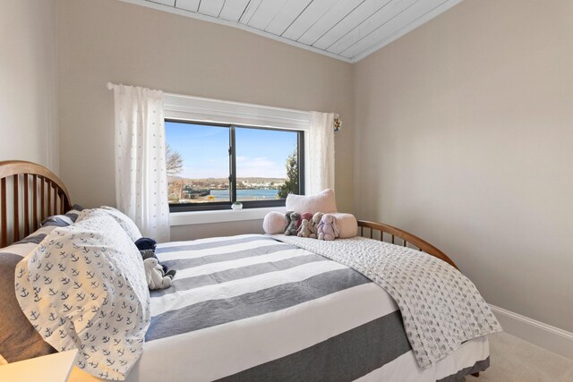 21 Atlantic St, Rockland, ME 04841 - carpeted bedroom featuring wood ceiling and baseboards