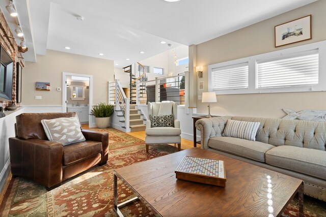 21 Atlantic St, Rockland, ME 04841 - living area featuring wood finished floors, recessed lighting, and stairway