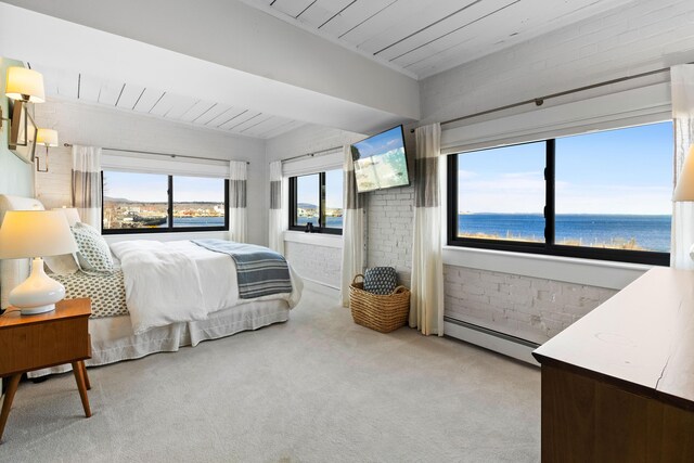 21 Atlantic St, Rockland, ME 04841 - bedroom with light carpet, brick wall, a baseboard heating unit, and wood ceiling