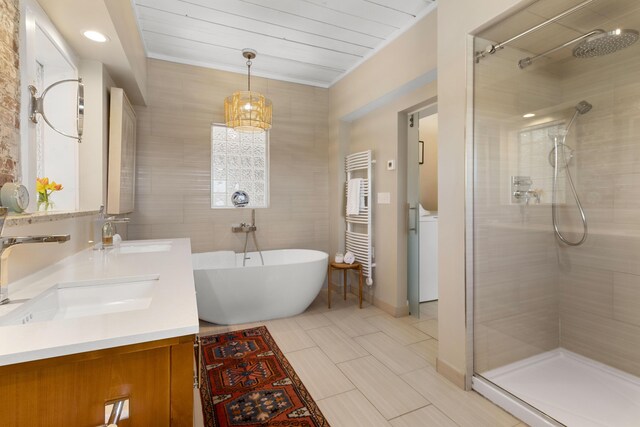21 Atlantic St, Rockland, ME 04841 - full bath with a sink, a soaking tub, and a stall shower