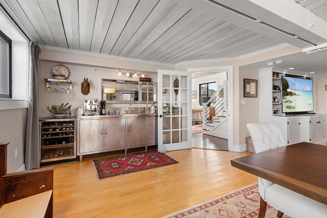 21 Atlantic St, Rockland, ME 04841 - bar with wooden ceiling, beverage cooler, wet bar, and ornamental molding