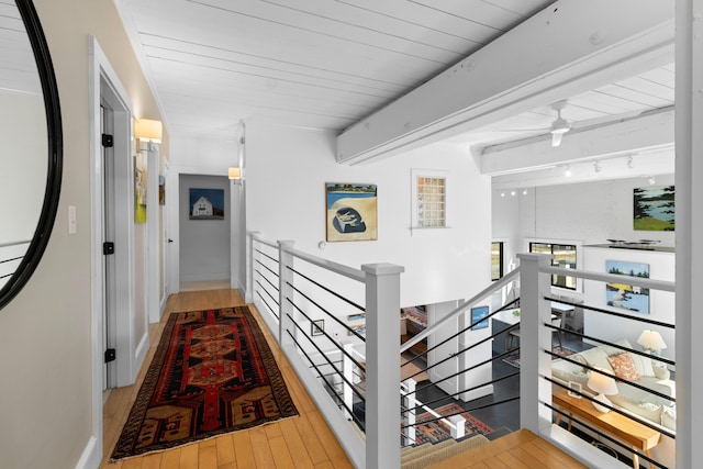 21 Atlantic St, Rockland, ME 04841 - hallway featuring an upstairs landing, hardwood / wood-style flooring, beam ceiling, and wood ceiling