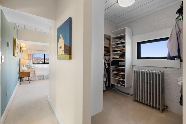 21 Atlantic St, Rockland, ME 04841 - corridor featuring radiator, baseboards, and carpet floors
