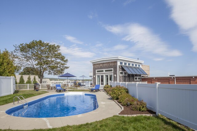 21 Atlantic St, Rockland, ME 04841 - view of pool featuring a fenced in pool, a patio area, a fenced backyard, and an outbuilding