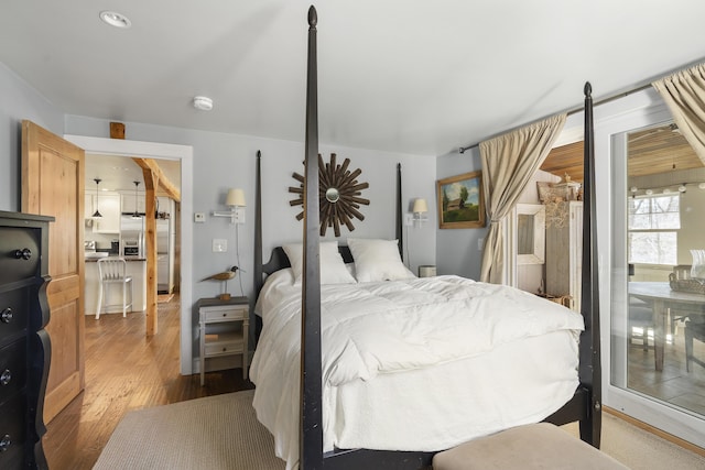 27 Miller Ln, Alfred, ME 04002 - bedroom featuring wood finished floors and stainless steel fridge with ice dispenser
