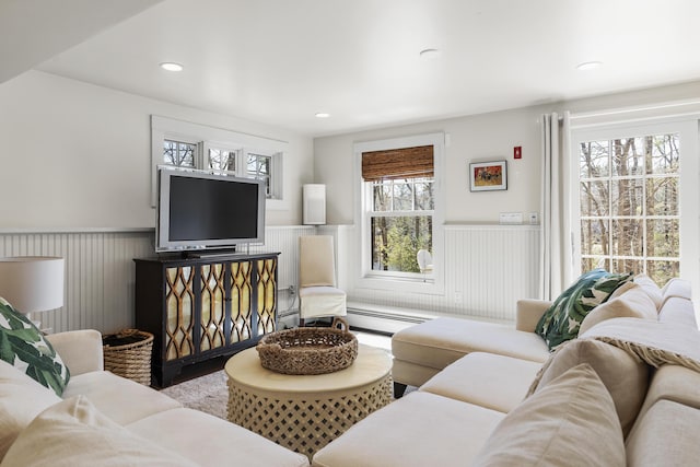 27 Miller Ln, Alfred, ME 04002 - living room with a baseboard radiator, a wainscoted wall, and recessed lighting