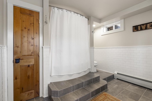 27 Miller Ln, Alfred, ME 04002 - full bathroom with curtained shower, baseboard heating, toilet, tile patterned flooring, and wainscoting