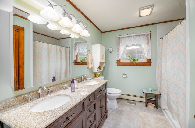 481 Washington Rd, Jefferson, ME 04348 - full bath featuring a sink, crown molding, a baseboard heating unit, and toilet
