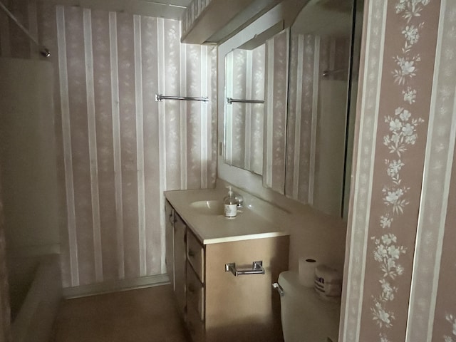 full bathroom featuring vanity and toilet