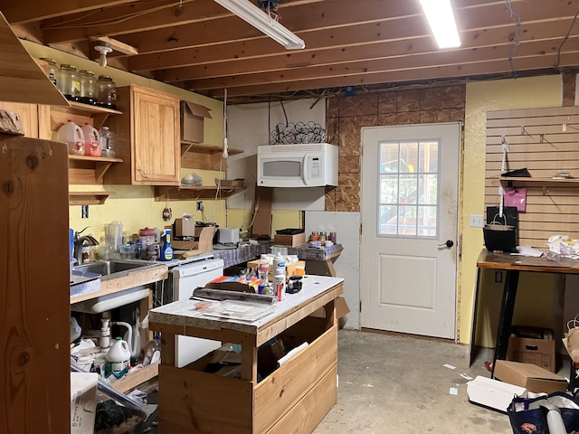 44 Webb Pond Rd, Eastbrook, ME 04634 - kitchen with white microwave, open shelves, light brown cabinetry, concrete flooring, and light countertops