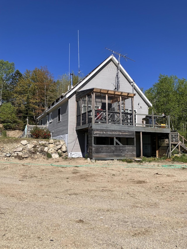 44 Webb Pond Rd, Eastbrook, ME 04634 - rear view of house with a deck
