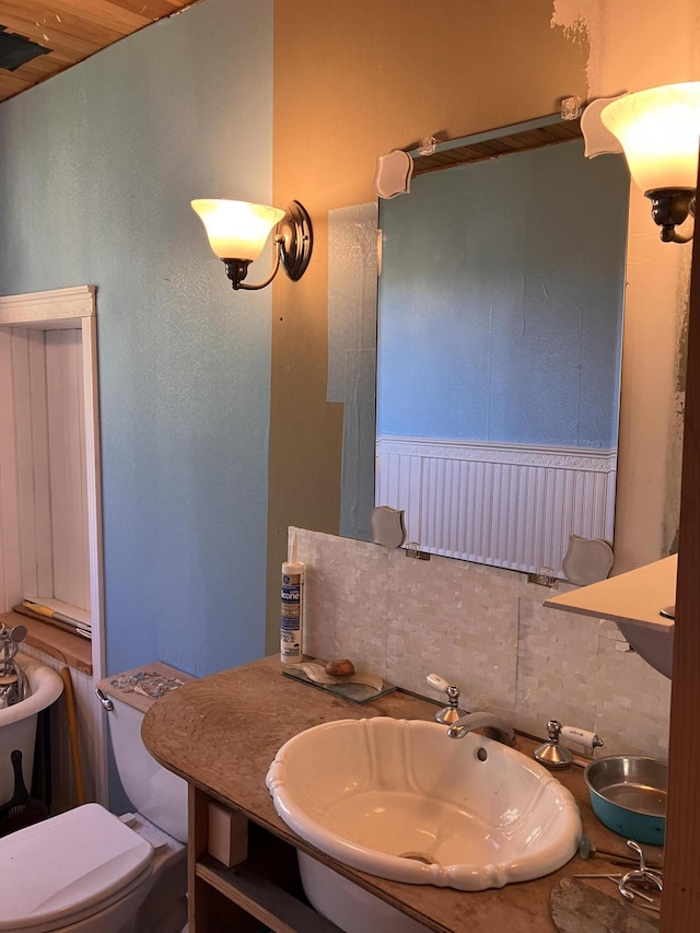 44 Webb Pond Rd, Eastbrook, ME 04634 - bathroom featuring a sink and tasteful backsplash
