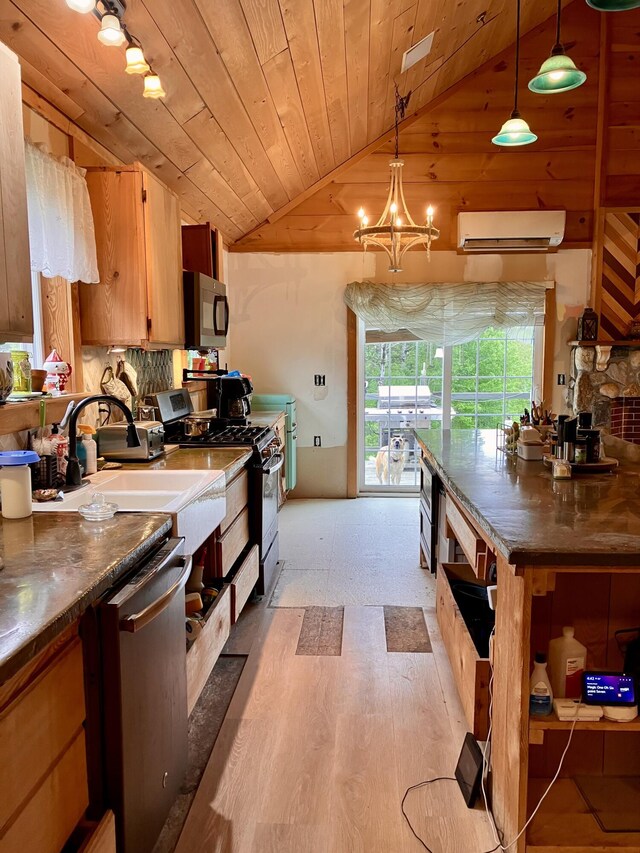 44 Webb Pond Rd, Eastbrook, ME 04634 - kitchen with gas range, dishwasher, lofted ceiling, a wall mounted air conditioner, and wooden ceiling