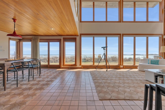 683 Kings Hwy, Kennebunkport, ME 04046 - living area with light tile patterned floors and wood ceiling