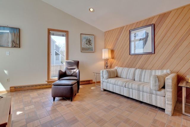 683 Kings Hwy, Kennebunkport, ME 04046 - living room with a baseboard radiator, wooden walls, baseboards, and lofted ceiling