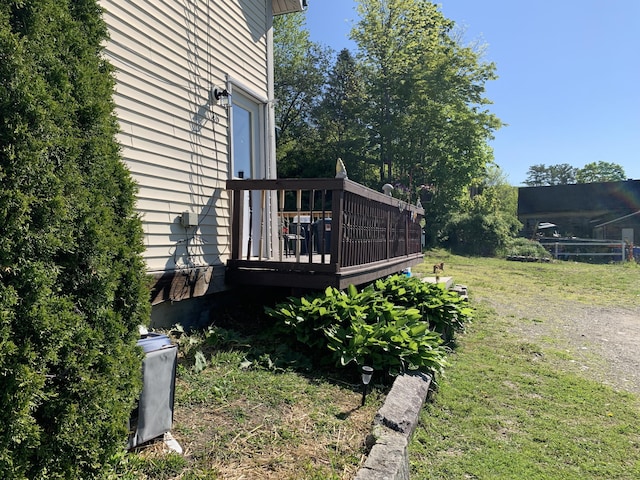 46 Windsor St, Randolph, ME 04346 - view of green lawn with a wooden deck