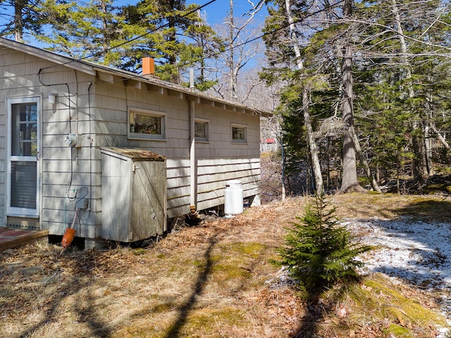 57 Samoset Trl, Boothbay, ME 04544 - view of side of home with a chimney