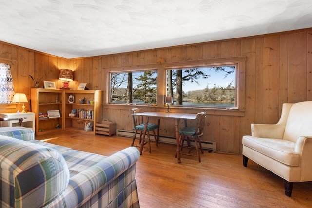 57 Samoset Trl, Boothbay, ME 04544 - bedroom with wooden walls, baseboard heating, and wood-type flooring