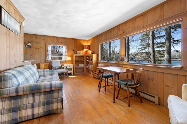 57 Samoset Trl, Boothbay, ME 04544 - living area with light wood-style flooring and wood walls