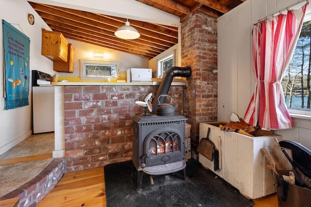 57 Samoset Trl, Boothbay, ME 04544 - details featuring wood finished floors and a wood stove