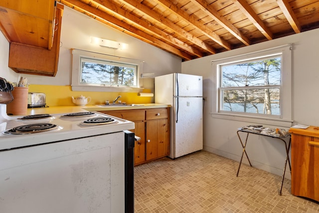 57 Samoset Trl, Boothbay, ME 04544 - kitchen featuring wooden ceiling, a wealth of natural light, beamed ceiling, and white appliances