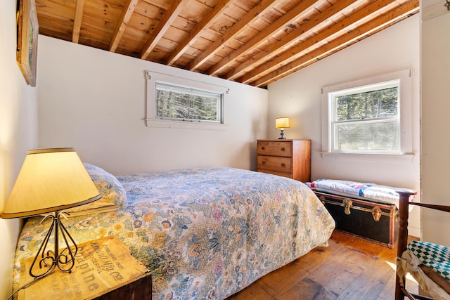 57 Samoset Trl, Boothbay, ME 04544 - bedroom with wooden ceiling, multiple windows, and lofted ceiling with beams