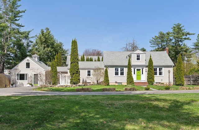 72 US Route 1, Falmouth, ME 04105 - cape cod home featuring a front yard and a chimney