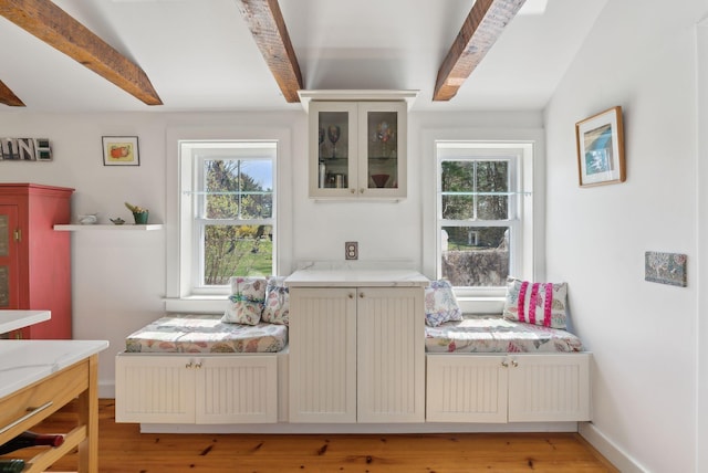 72 US Route 1, Falmouth, ME 04105 - sitting room with beam ceiling, healthy amount of natural light, light wood-style flooring, and baseboards