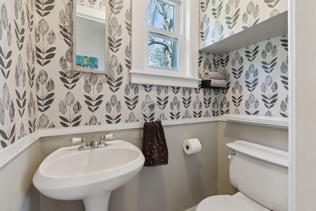 72 US Route 1, Falmouth, ME 04105 - bathroom with toilet, a sink, and wallpapered walls