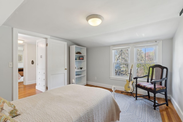 72 US Route 1, Falmouth, ME 04105 - bedroom featuring wood finished floors and baseboards