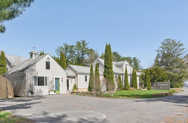 72 US Route 1, Falmouth, ME 04105 - view of front of house with fence and driveway