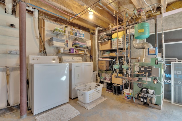 unfinished basement with washing machine and dryer