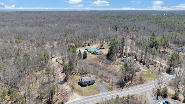 bird's eye view featuring a view of trees