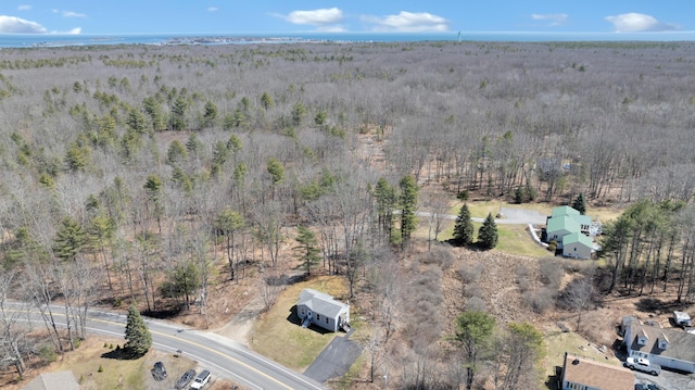 aerial view featuring a forest view