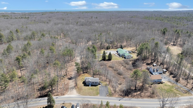aerial view featuring a forest view