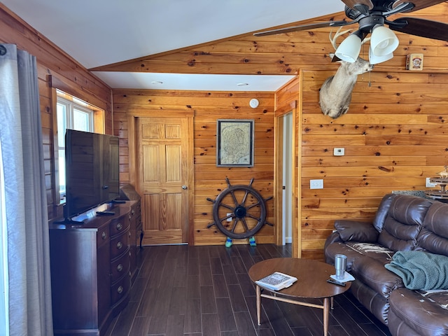 441 Works Rd, Jackson, ME 04921 - living room featuring vaulted ceiling, dark wood finished floors, wood walls, and a ceiling fan