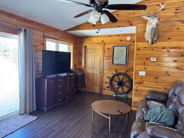 441 Works Rd, Jackson, ME 04921 - living area with lofted ceiling, dark wood-style flooring, wood walls, and ceiling fan