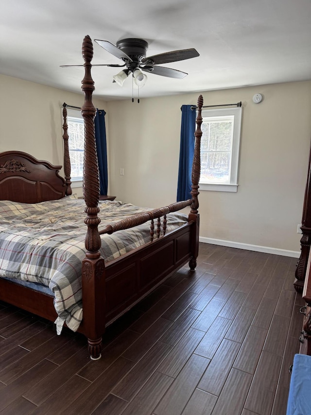 441 Works Rd, Jackson, ME 04921 - bedroom featuring multiple windows, dark wood finished floors, and baseboards