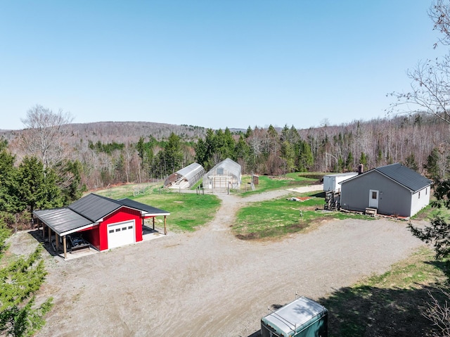 441 Works Rd, Jackson, ME 04921 - drone / aerial view featuring a wooded view