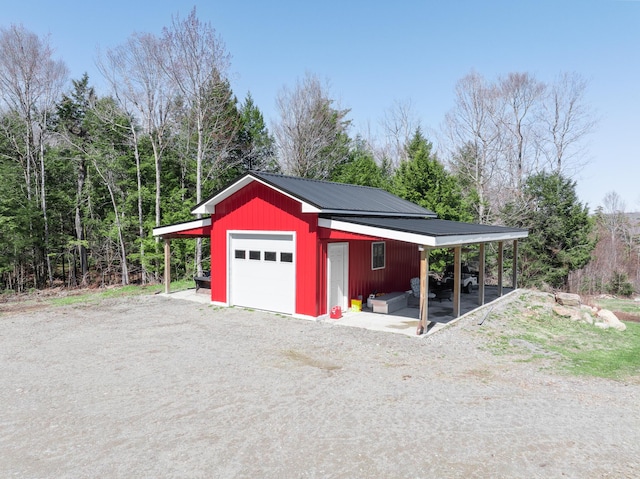 441 Works Rd, Jackson, ME 04921 - garage featuring dirt driveway and a detached garage