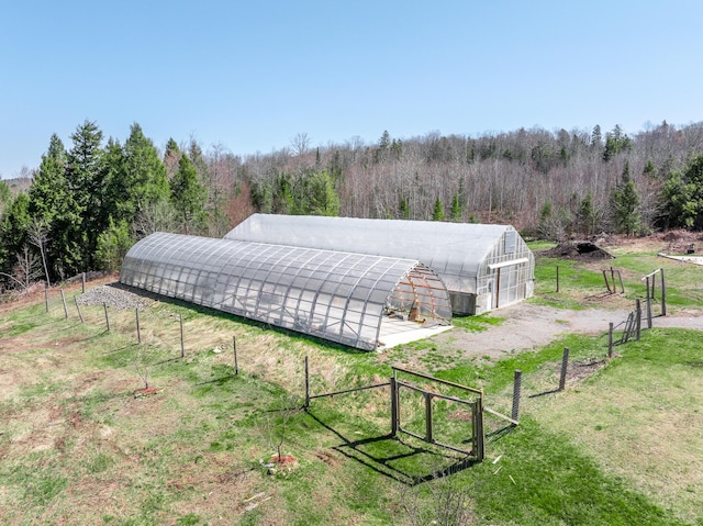 441 Works Rd, Jackson, ME 04921 - exterior space with a yard, a wooded view, and fence
