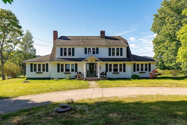 480 Sound Dr, Mount Desert, ME 04660 - view of front of home with a chimney, driveway, and a front lawn