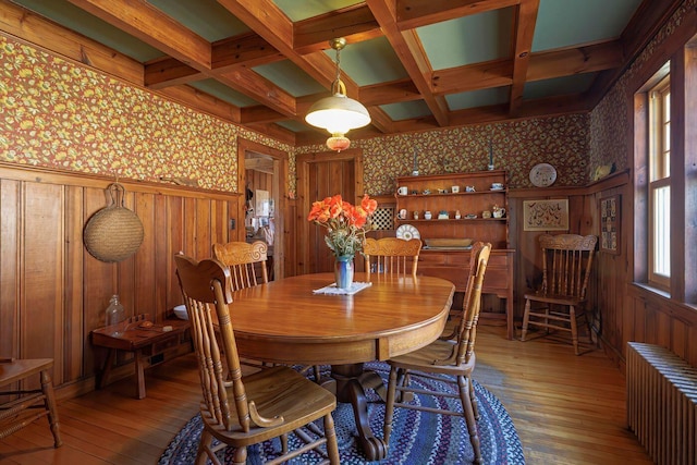 480 Sound Dr, Mount Desert, ME 04660 - dining room with wallpapered walls, radiator, wood-type flooring, and wainscoting