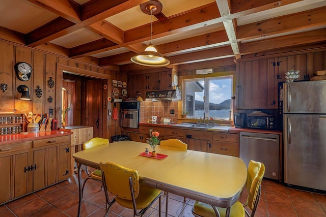 480 Sound Dr, Mount Desert, ME 04660 - kitchen featuring beamed ceiling, decorative backsplash, coffered ceiling, and stainless steel appliances