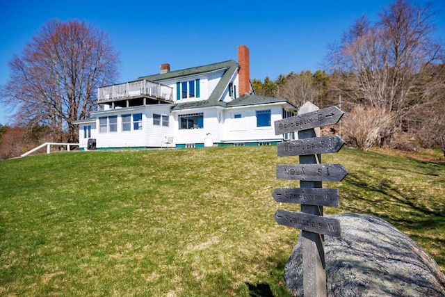 480 Sound Dr, Mount Desert, ME 04660 - back of house with a chimney, a balcony, and a lawn