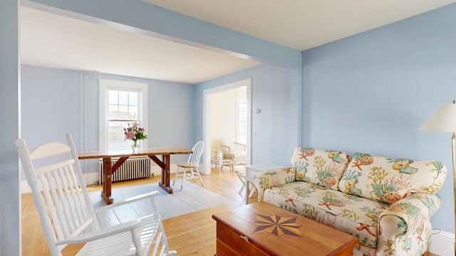 19 Spruce Head Rd, South Thomaston, ME 04858 - living room with radiator and light wood-style flooring